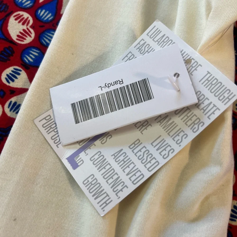 LuLaRoe Multicolor Geometric Pattern Randy Tee - Picture 2 of 6